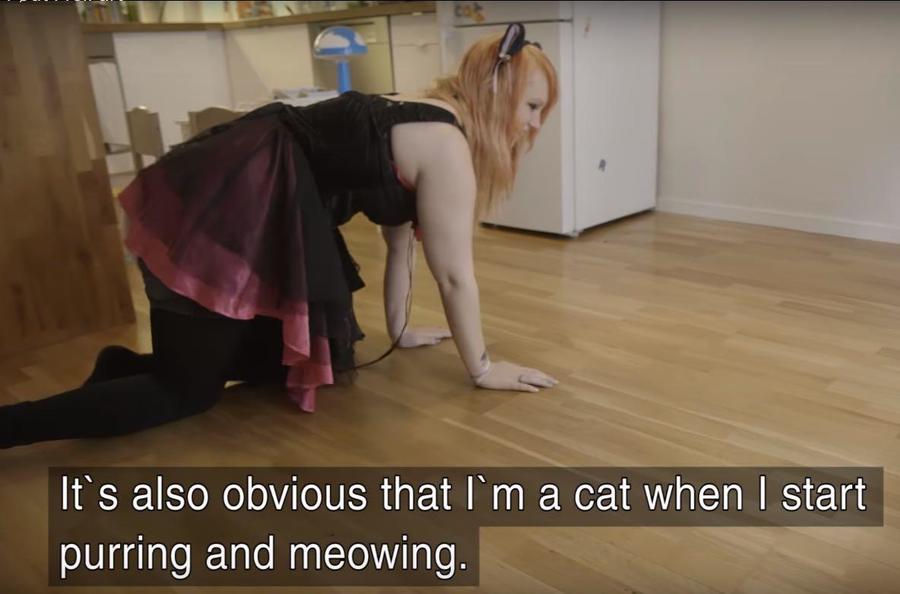 woman thinks she is a cat.jpg