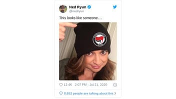 Fact Check: Cathy Areu Did NOT Pose For A Photo In An Antifa Cap