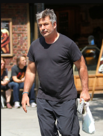 Fact Check: Photo Of Alec Baldwin Wearing A 'Guns Don't Kill People' T-Shirt Is NOT Real -- It Has Been Altered