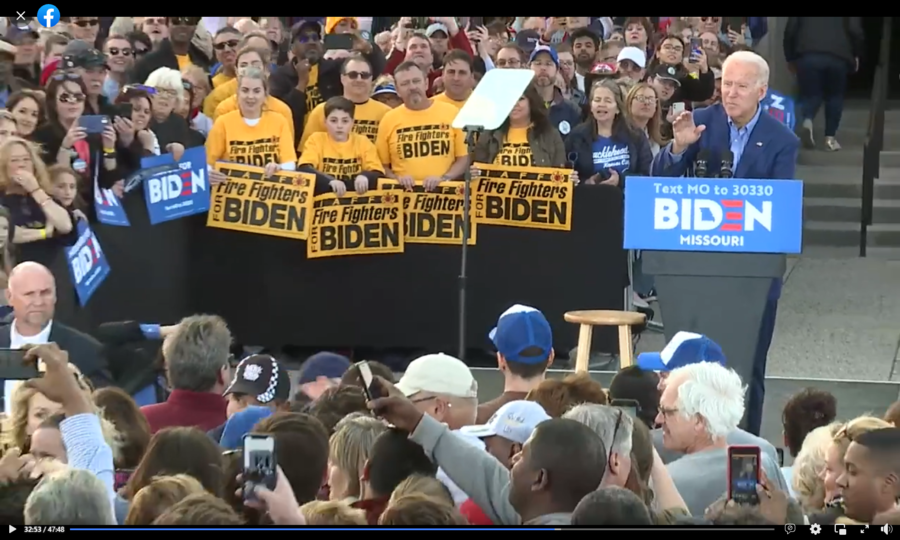 biden at podium sign.PNG