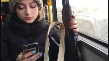 Fact Check: Photo Of Young Woman With Rifle Is NOT February 2022 In Ukraine