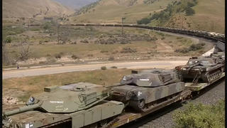 Fact Check: Footage Of Train Carrying Tanks Is NOT Headed To Ukraine -- Shows California In 2017
