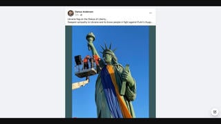 Fact Check: Ukrainian Flag Was NOT Draped On Statue Of Liberty -- This Is Replica In France