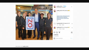 Fact Check: Waitress Is NOT Holding Dr. Oz Sign To Read 'NO' -- This Photo Has Been Edited