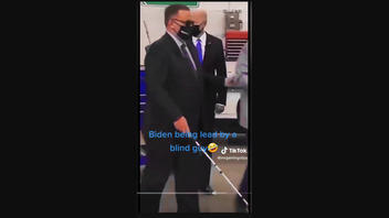 Fact Check: Joe Biden Is NOT Being Led By A Blind Man In Video