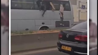 Fact Check: Migrants Filmed Jumping From Bus Were NOT In Germany -- Filmed In Algeria