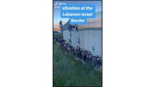 Fact Check: Video Does NOT Show People Climbing Wall At Lebanon-Israel Border In October 2023 - It's From 2021