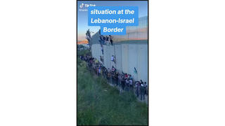 Fact Check: Video Does NOT Show People Climbing Wall At Lebanon-Israel Border In October 2023 - It's From 2021