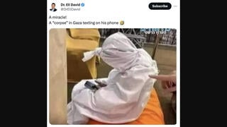 Fact Check: Photo Does NOT Show Gaza 'Corpse ... Texting On His Phone' -- Image Predates 2023 Conflict