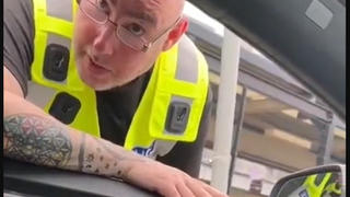 Fact Check: Video Does NOT Show Real British Policeman Questioning Motorist Waiting At Train Station -- It's A Skit