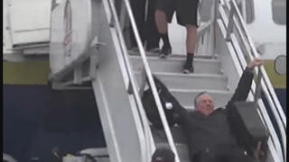 Fact Check: Video Does NOT Show Gavin Newsom Falling Down Steps While Deplaning -- It's 2014 Footage Of Tommy Tuberville