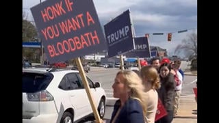 Fact Check: Rep. Marjorie Taylor Greene Did NOT Hold 'Honk If You Want A Bloodbath' Sign -- It's An Edited Video