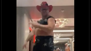 Fact Check: EDITED Video Post Implies That's Tim Walz Dancing In Cowboy Hat, 2-Piece Outfit -- But It's Someone Else