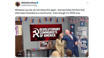 Fact Check: Sign Is NOT Real In Video Of Kamala Harris, Tim Walz Posing In Front Of 'Revolutionary Communists of America' Poster -- Image Has Been Altered