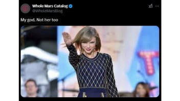 Fact Check: ALTERED Image Shows Taylor Swift Giving Right-Handed Salute -- Image From 2014 Performance Is Flipped