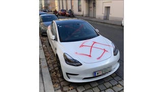 Fact Check:  2023 Photo of Swastika Spray-Painted on Tesla in Austria Predates 2025 Elon Musk Controversy