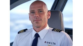 Fact Check: AI-Generated Image Does NOT Show Delta Crash Pilot Jonathan Simpson -- Person Is Adult Film Star