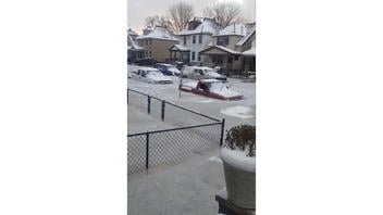 Fact Check: Video Of Cars Frozen In Ice On A Residential Street Shows Aftermath of Detroit Water Pipe Burst -- Footage Geolocated