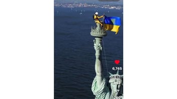 Fact Check: AI Video Shows Ukrainian Flag Hoisted On Statue Of Liberty Torch