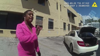 Fact Check: Staged Video Shows Black Female Lawyer Arguing With Cop Over Throwing Out Trash At Her Office