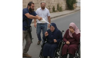 Fact Check: AI Image Does NOT Show Actual Jewish Settlers Splashing Liquid On Palestinian Woman In Wheelchairs