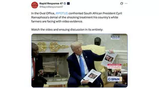 Fact Check: Picture Held Up By Trump In Oval Office Meeting Did NOT Show Body Bags For 'White farmers' In South Africa