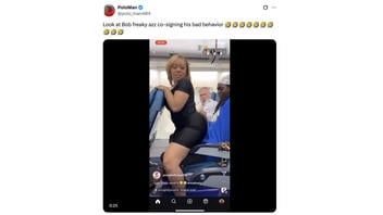 Fact Check: FAKE Video Shows Man Smacking Airline Passenger as She Moves Into Aisle