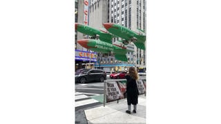 Fact Check: Ad Agency Created 'Iran Is Your Problem Too' Video With Missile Shaped Balloons Floating Through New York Street -- Digital Creation