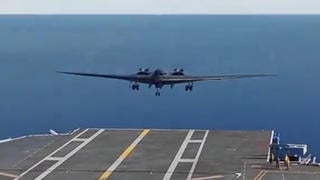 Fact Check: Videogame Video Shows B2 Bomber Landing On Aircraft Carrier -- Not Real, Not Recent