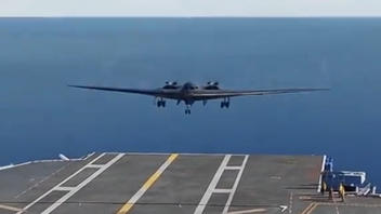 Fact Check: Videogame Video Shows B2 Bomber Landing On Aircraft Carrier -- Not Real, Not Recent