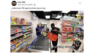 Fact Check: FAKE Video Shows Black Undercover FBI Agent 'Schooling' Cop On the Law at Supermarket