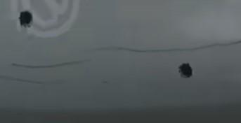 bullet holes tesla shot.jpg
