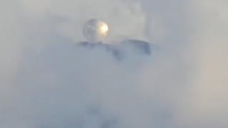 Fact Check: Video Does NOT Show Massive Metallic UFO Orb Over A Volcano In Mexico -- It's A Large Millimeter Telescope On Sierra Negra
