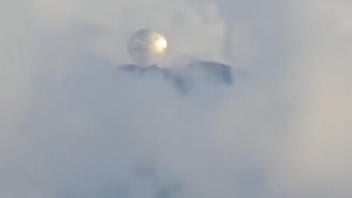 Fact Check: Video Does NOT Show Massive Metallic UFO Orb Over A Volcano In Mexico -- It's A Large Millimeter Telescope On Sierra Negra