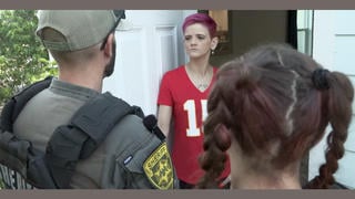Fact Check: Video Of Sheriff's Deputy Asking Purple-Haired Woman About Color Of Her Carpet And Curtains Is NOT Authentic 