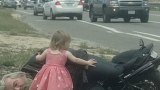 Fact Check: Girl In Princess Dress Helping An Injured Biker Is NOT Real -- There's No 'Ashford' On Route 27 And The Picture Is AI-Generated