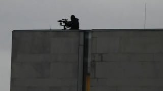 Fact Check: Photo Of Rooftop Sniper Is NOT Related To Charlie Kirk Shooting -- Appeared In A 2019 Onion Article