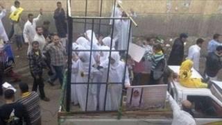 Fact Check: Photo Does NOT Show ISIS Parading Caged Yazidi Women In Mosul Before Burning Them To Death - It's A 2013 Street Protest In Egypt