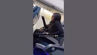 Fact Check: FAKE Video Shows Man Tricked Into Opening Airplane Bathroom With Woman Inside -- It's A Skit