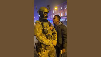 Fact Check: Fake Video Of Shouting Protester Getting Pepper Sprayed In The Face By A Riot Police Officer -- It's AI-Generated