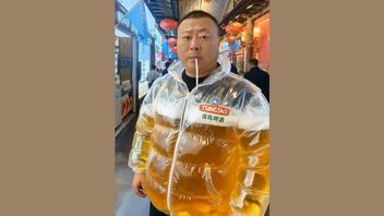 Fact Check: Photo Does NOT Show A Real Tsingtao Beer-Filled Puffer Parka With A Straw -- Physics and AI Glitches Debunk The Image