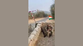 Fact Check: Monkey Did NOT Fire A Gun While Indian Checkpoint Guard Slept -- Video Is AI-Generated