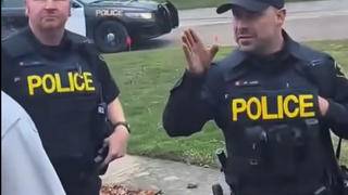 Fact Check: Video Of Police Threatening To Arrest Man For Mowing Elderly Person's Lawn For Free Is NOT Real