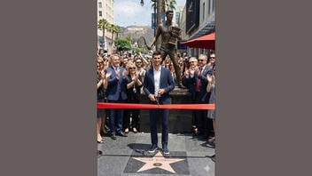 Fact Check: A Full-Body Bronze Statue On Hollywood Walk Of Fame Was NOT Erected For Streisand, Cher, Dolly Nor Novak Djokovic -- Spam From Vietnam