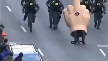 Fact Check: 'Chair Chase' Video Of ICE Agents Chasing Huge Hand Giving 'The Finger' On Minneapolis Street Is NOT Real -- AI Made This Joke