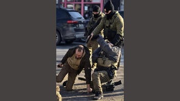 Fact Check: AI-Altered Image Of Immigration Officers' Scuffle With Alex Pretti Is NOT A Reliable Picture Of The Scene -- Pulled From Blurry Video