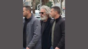Fact Check: Jeffrey Epstein Was NOT Photographed Recently In Tel Aviv, Israel -- A Gemini AI Watermark Shows On The Uncropped Image