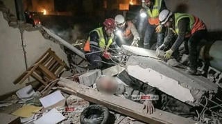Fact Check: AI Photo Of Khamenei Body Pulled From Rubble By Rescue Workers Has SynthID Watermark -- Not Released By Iran