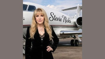 Fact Check: Fake Pictures Show Stevie Nicks And Other Celebrities With Their $80 Million Private Jets -- Clickbait From Overseas