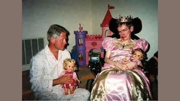 Fact Check: FAKE Photos Of Bill Clinton And Stephen Hawking Dressed In Pajamas And A Princess Outfit -- They're AI